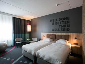 Ein Bett oder Betten in einem Zimmer der Unterkunft HUP