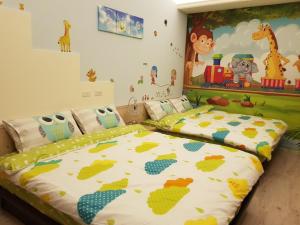 Tempat tidur dalam kamar di Xin Ching B&B