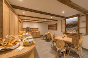 Waldheim Appartements 레스토랑 또는 맛집