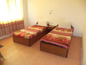 Krevet ili kreveti u jedinici u okviru objekta Seven Steps Guest House