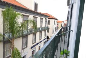 a view from a balcony of a building at Edificio Charles 204 in Funchal +21 photos