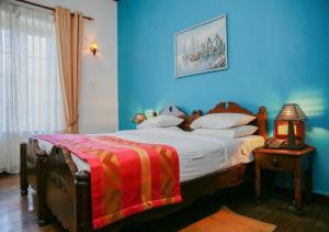 Postel nebo postele na pokoji v ubytování Hotel Glendower