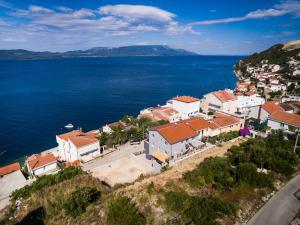 an aerial view of a town next to the water at Apartment Bonaca in Komarna