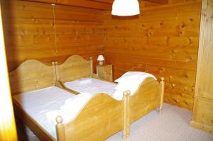 Ένα ή περισσότερα κρεβάτια σε δωμάτιο στο Chalet BETHEL