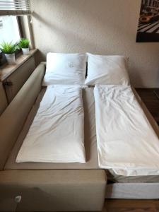Posteľ alebo postele v izbe v ubytovaní Ferienwohnung Gisela