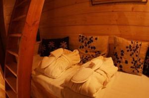 Postel nebo postele na pokoji v ubytování Les Cabanes en Provence