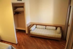 Postel nebo postele na pokoji v ubytování Hotel Ottagono