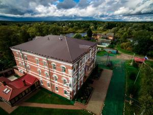 an overhead view of a large brick building with a roof at Volkhov Most in Chudovo