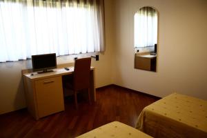 TV a/nebo společenská místnost v ubytování Hotel Ottagono