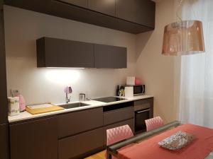 Voodi või voodid majutusasutuse Madeleine apartments - Brera toas