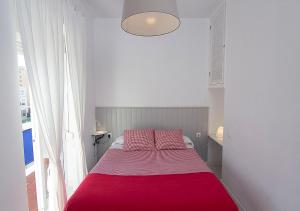 Postel nebo postele na pokoji v ubytování Hotel Finlandia