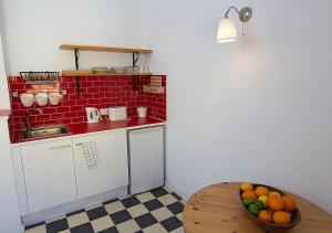 Kuchyň nebo kuchyňský kout v ubytování Hotel Finlandia