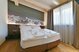 Foto de la galería de Dolomeet Boutique Hotel en Pinzolo