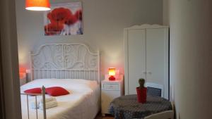 Postel nebo postele na pokoji v ubytování B&B Il Paiolo