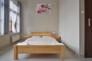 Łóżko lub łóżka w pokoju w obiekcie Dom Turysty PTTK w Bielsku - Białej
