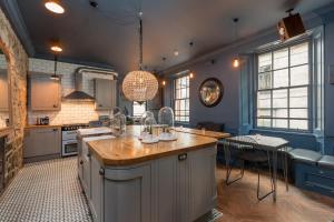 Una cocina o zona de cocina en The Baxter Hostel