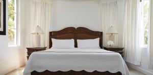 Cama o camas de una habitación en Windjammer Landing Resort and Residences
