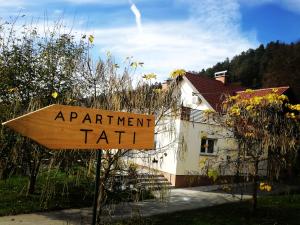a sign in front of a house with a apartment hall at Apartment Tati in Dol pri Ljubljani +22 photos