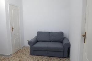 Uma área de estar em Cefalù Caldura house