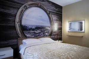 Una cama o camas en una habitación de ThessPalace
