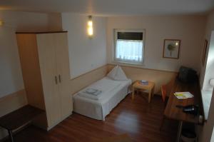 Postel nebo postele na pokoji v ubytování Pension Weber + 22 fotografií