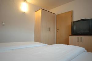 Postel nebo postele na pokoji v ubytování Pension Weber