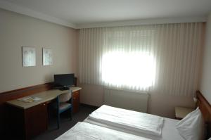Postel nebo postele na pokoji v ubytování Pension Weber