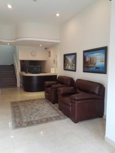 Posezení v ubytování Hotel Quinta