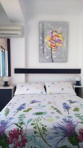 Ένα ή περισσότερα κρεβάτια σε δωμάτιο στο El Mirador del Port