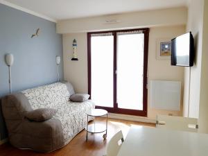 TV a/nebo společenská místnost v ubytování BEL Appartement jolie vue Mer + 17 fotografií