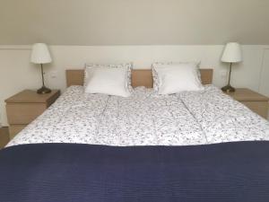 Postel nebo postele na pokoji v ubytování B&B Wannes Suite