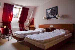 Posteľ alebo postele v izbe v ubytovaní Hotel Iberia