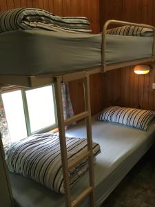 Postel nebo postele na pokoji v ubytování A'Wangralea Caravan Park