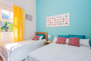 Cama ou camas em um quarto em Bhaus Juqueí | Beach House | Praia
