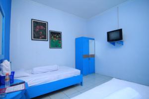 Imagen de la galería de Hotel Boegenviel Syariah, en Lamongan