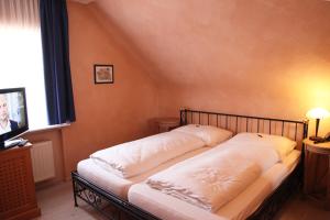 Postel nebo postele na pokoji v ubytování Hotel La Scala