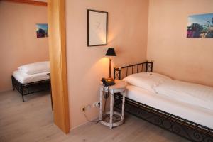 Postel nebo postele na pokoji v ubytování Hotel La Scala