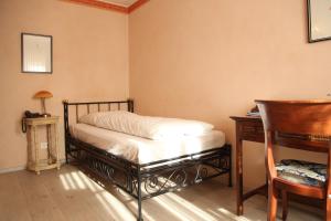 Postel nebo postele na pokoji v ubytování Hotel La Scala