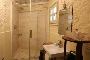 Koupelna v ubytování Residenza d'Epoca Regina d'Arborea