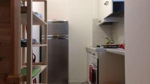 A kitchen or kitchenette at Le JOLI COIN DU PASSAGE - CIR 0306