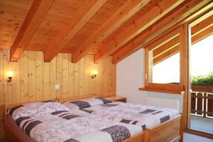 Postel nebo postele na pokoji v ubytování Haus Pan