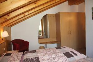 Postel nebo postele na pokoji v ubytování Haus Pan