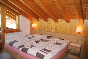 Postel nebo postele na pokoji v ubytování Haus Pan
