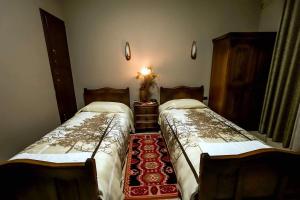 Voodi või voodid majutusasutuse Real Scampis Hotel toas