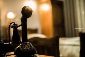 Voodi või voodid majutusasutuse Real Scampis Hotel toas