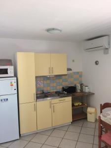 Kuchyň nebo kuchyňský kout v ubytování Flanell Apartments