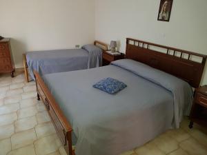 Postel nebo postele na pokoji v ubytování B&B Via Roma