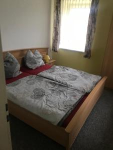 
Ein Bett oder Betten in einem Zimmer der Unterkunft Dos Gauchos
