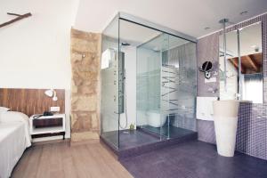 Ein Badezimmer in der Unterkunft Hotel Restaurante Masía la Torre