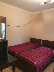 Postel nebo postele na pokoji v ubytování Guest House Nua